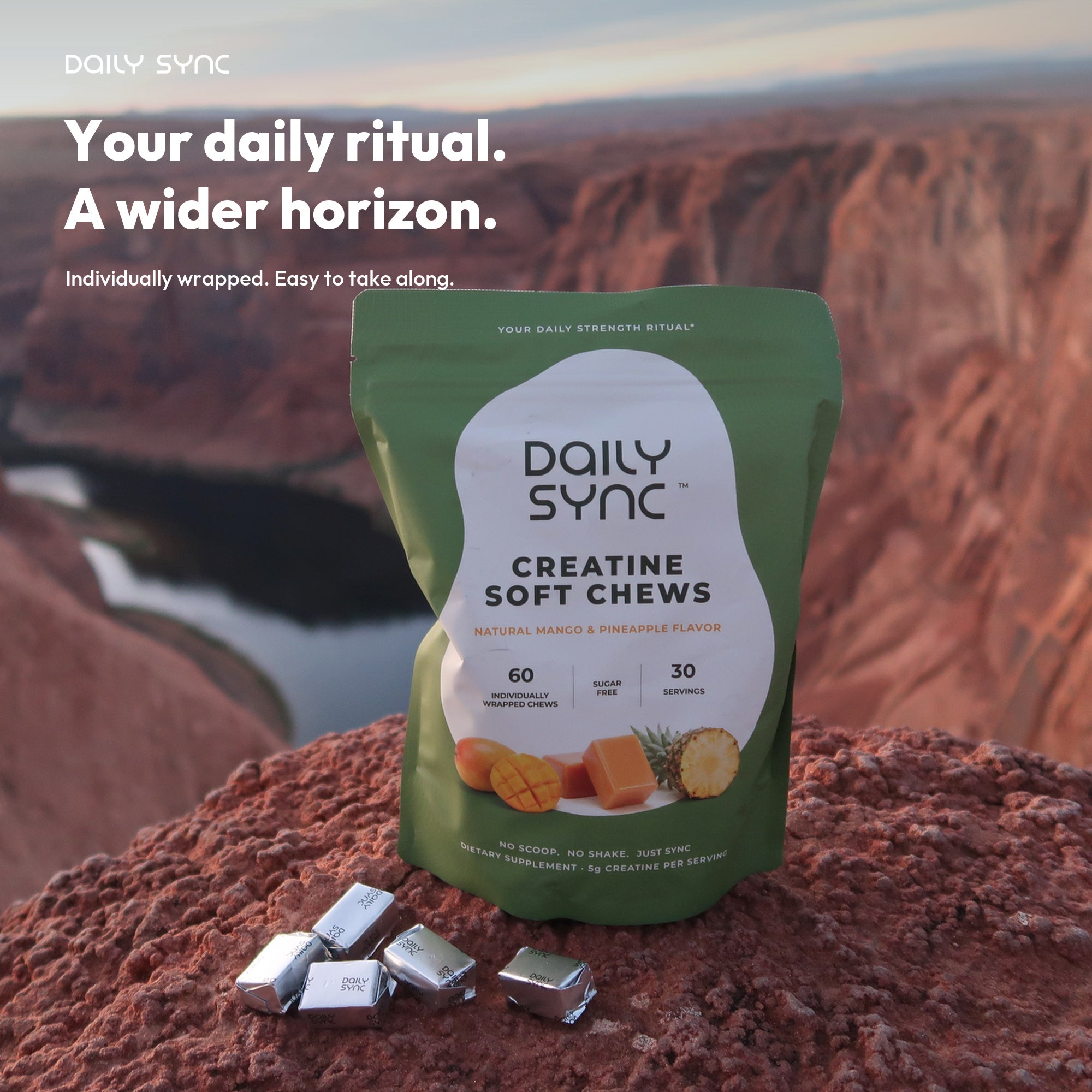 Daily Sync pouch and real individually wrapped chews at a canyon overlook